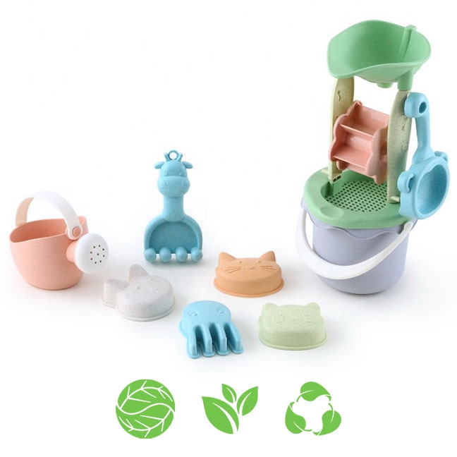 woopie-green-zestaw-do-piasku-w-wiaderku-z-kolowrotkiem-9-el-biodegradowalny-organiczny-material