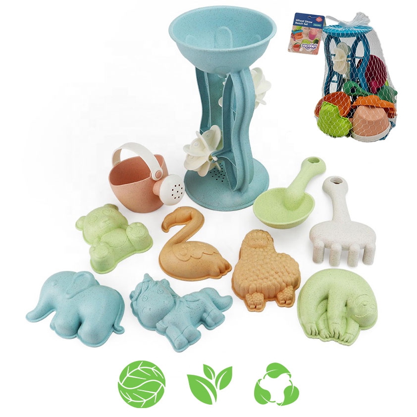 woopie-green-zestaw-do-piasku-z-kolowrotkiem-i-konewka-10-el-biodegradowalny-organiczny-material